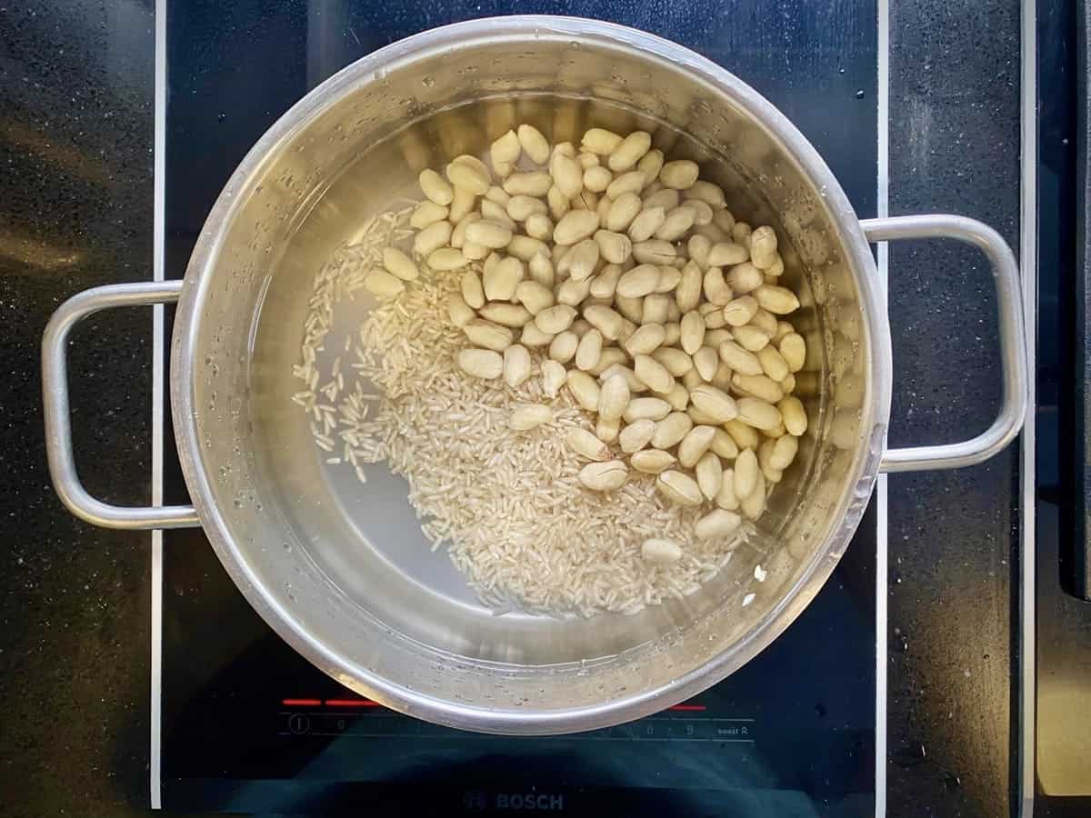 For every cup of rice, add 6 cups of water together with peanuts