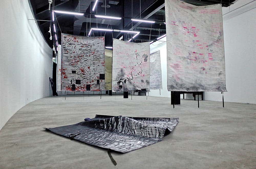 The tarpaulin works of Chong Kim Chiew that surrounded his video projection (not pictured). Image credit: Chong Kim Chiew. 