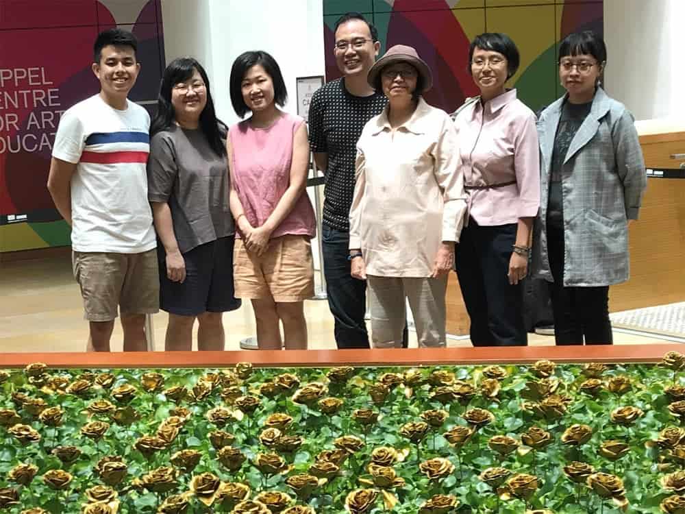 Curator Seng Yu Jin and the Artwork and Exhibition Management team with artist Siti Adiyati