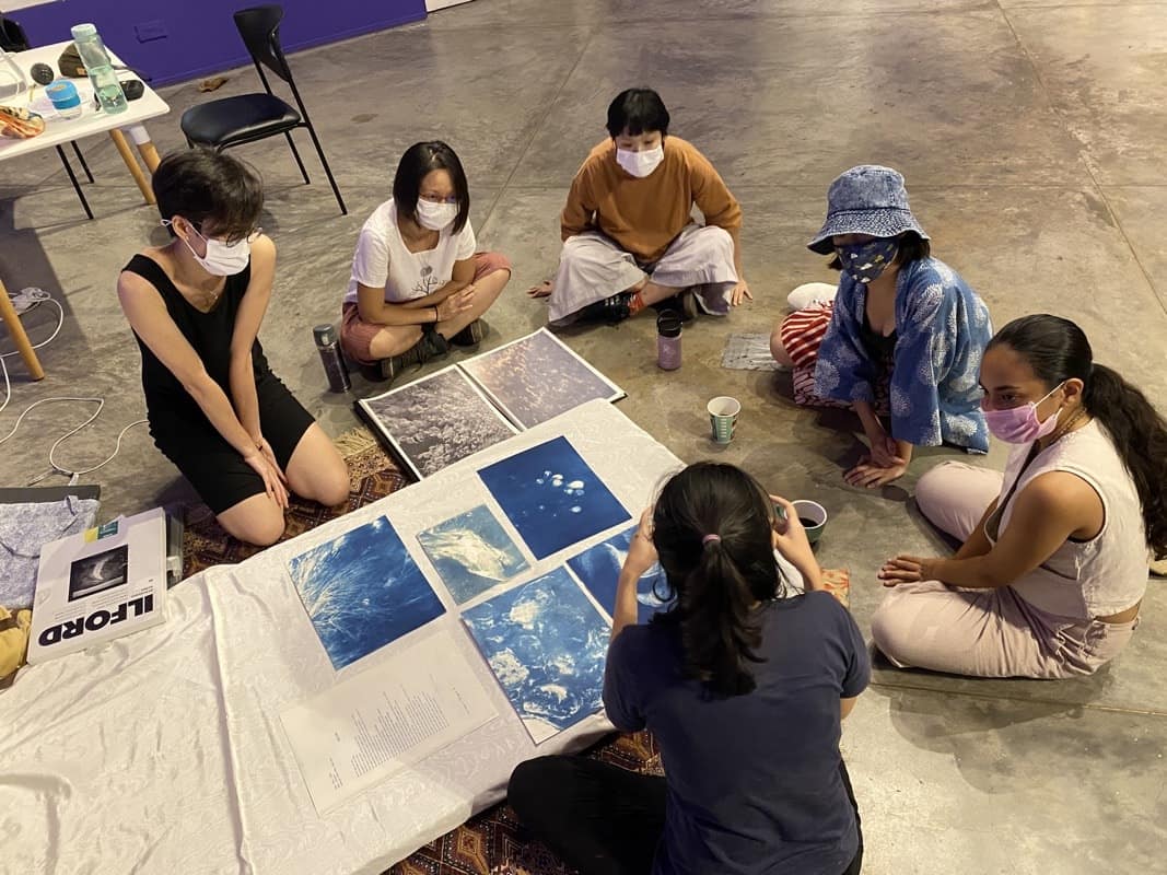 Conscious Connections artists sharing their work during an open studio visit