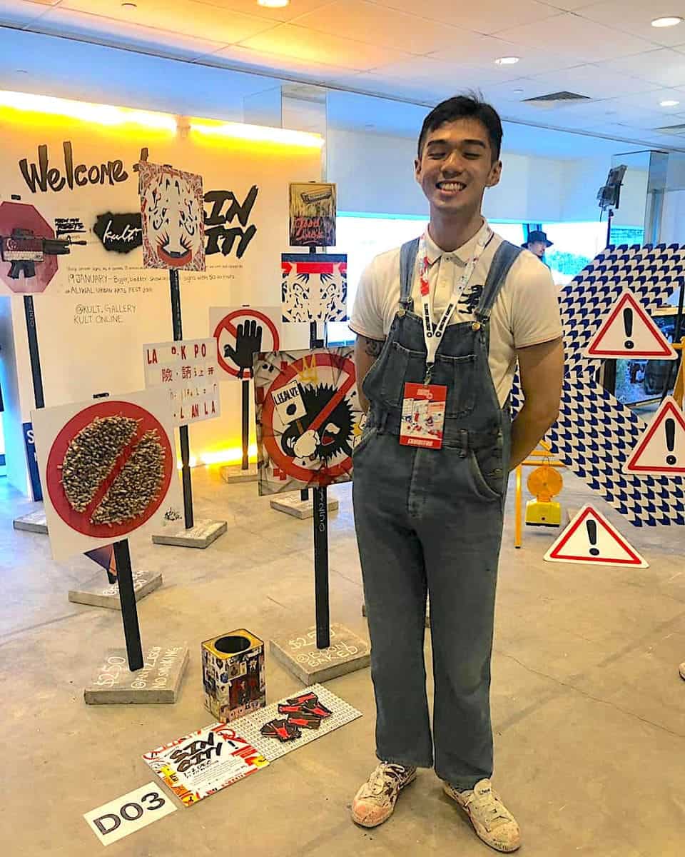 Jenson Tan at the 2018 edition of Culture Cartel, representing the art gallery Kult - his dungarees are from a thrift store, and his Feiyue shoes are from Taobao