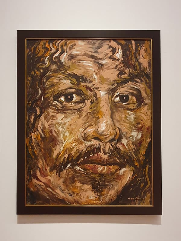 One of only two known self-portraits of Mohammad Din, titled Self Portrait – Split NFS (Not For Sale) Personality (1999).