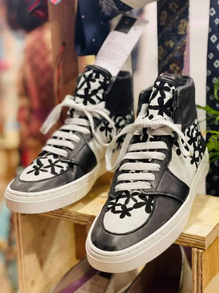 Shoemaker Lisa Teng, of Lisa Teng Studios upcycled discarded leather to make these cool sneakers.