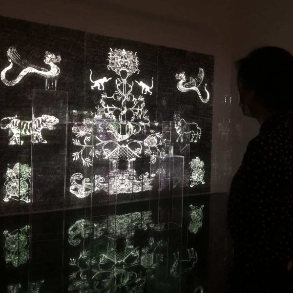 Indah Arsyad, The Ultimate Breath (2022), Digital video projection, acrylic, boxes, glass vessels, water, sound, 6'43". Installation view at the National Gallery of Indonesia, Jakarta, 2022.